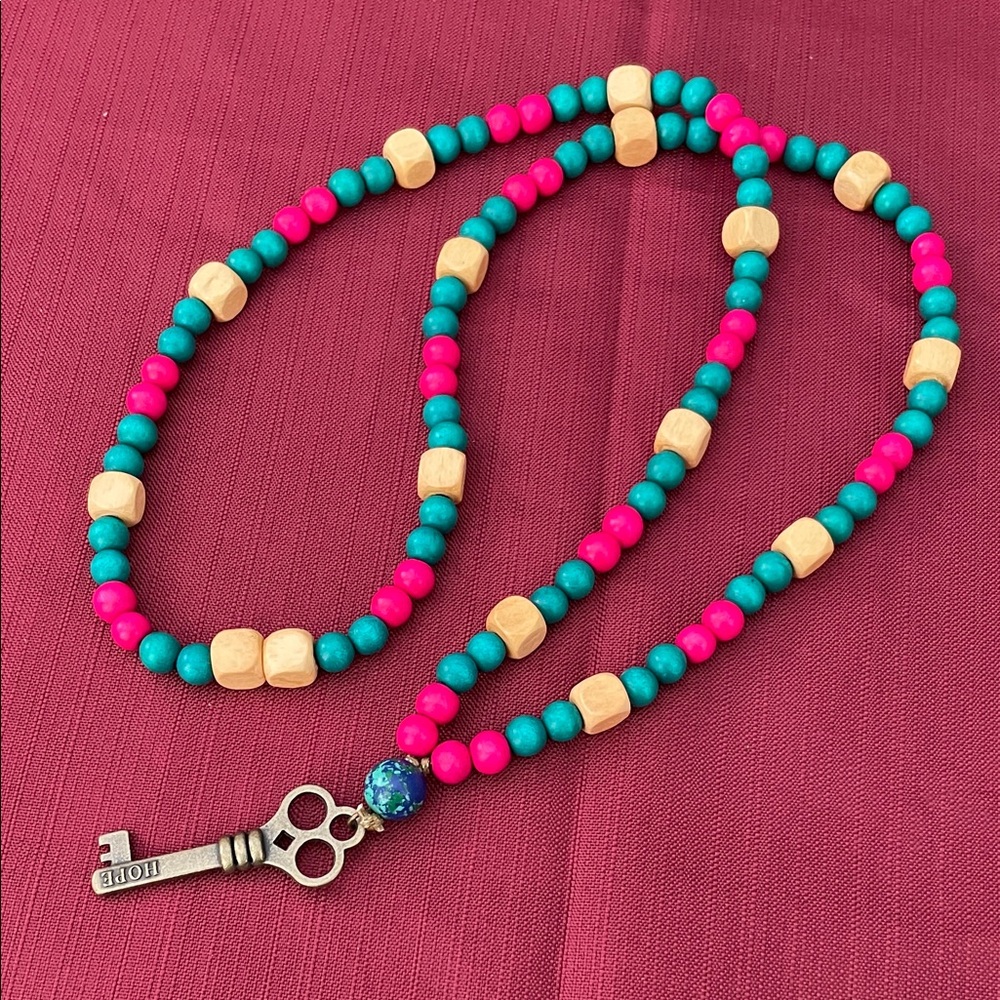 Hand assembled beaded necklace hope key